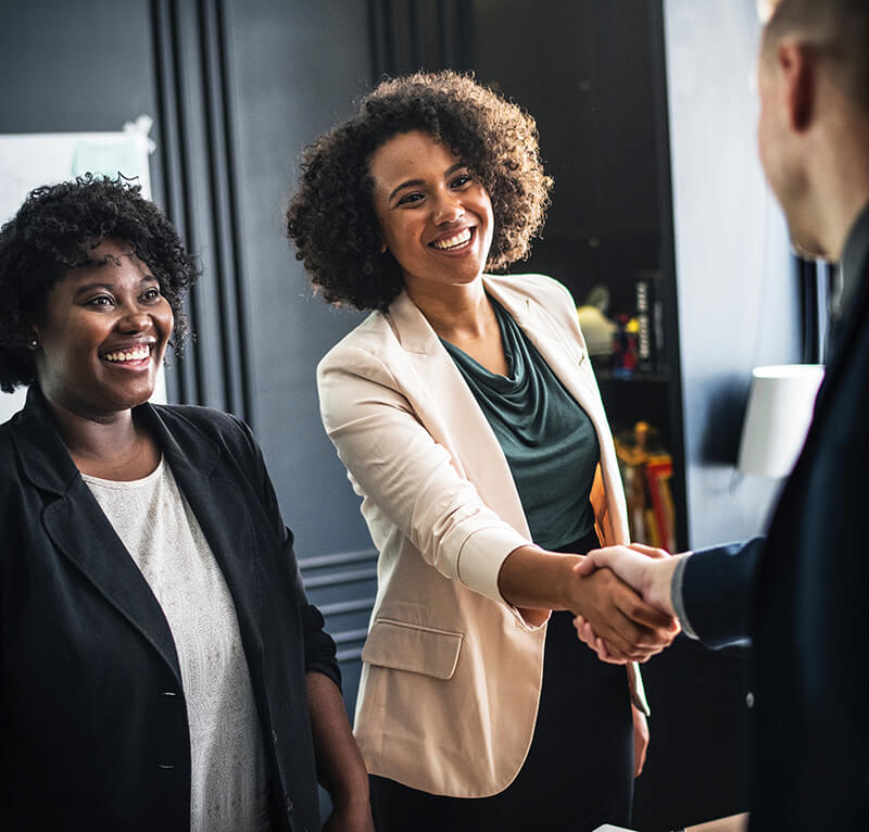 Board members shaking hands